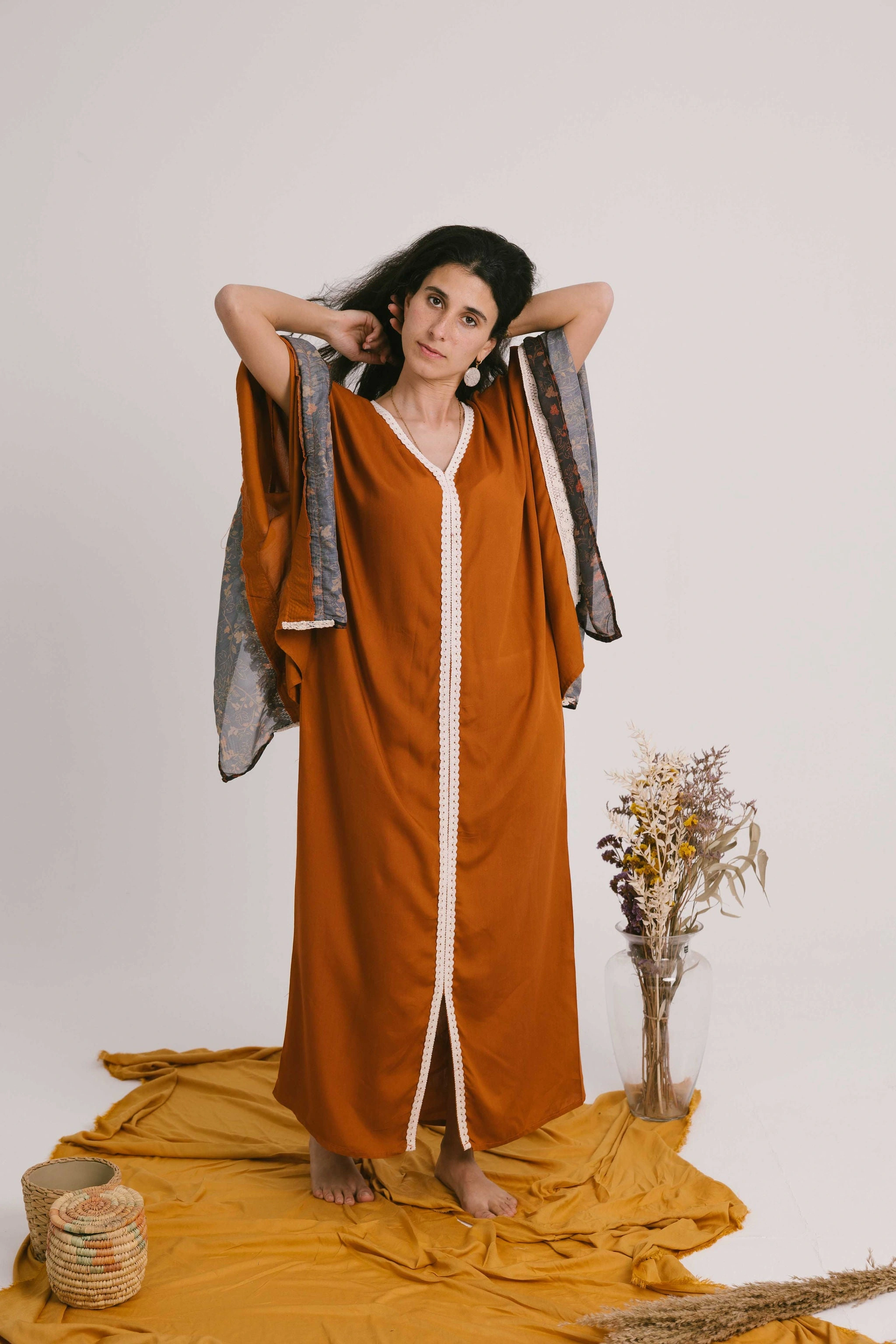 Floral Angel Wings: Desert Bloom's Camel Caravan.